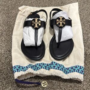 Tory Burch black leather sandals with gold accents size 8.